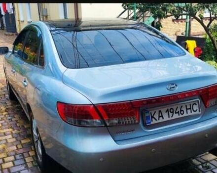 Серый Хендай Грандер, объемом двигателя 3.34 л и пробегом 300 тыс. км за 4600 $, фото 1 на Automoto.ua