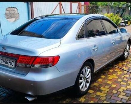 Серый Хендай Грандер, объемом двигателя 3.34 л и пробегом 300 тыс. км за 4600 $, фото 5 на Automoto.ua