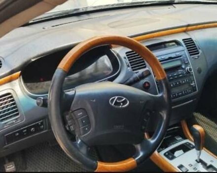 Серый Хендай Грандер, объемом двигателя 3.34 л и пробегом 300 тыс. км за 4600 $, фото 6 на Automoto.ua