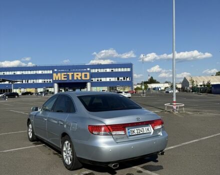 Серый Хендай Грандер, объемом двигателя 3.3 л и пробегом 250 тыс. км за 4999 $, фото 4 на Automoto.ua