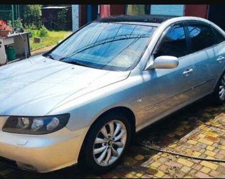 Серый Хендай Грандер, объемом двигателя 3.34 л и пробегом 300 тыс. км за 4600 $, фото 7 на Automoto.ua