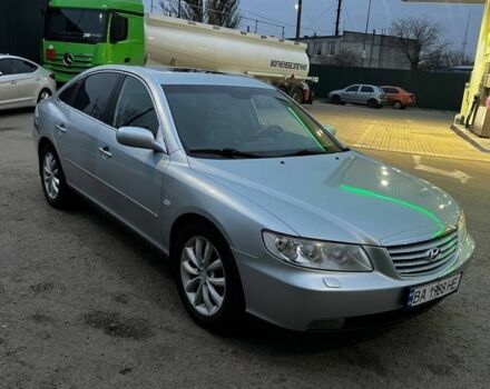 Серый Хендай Грандер, объемом двигателя 3.3 л и пробегом 200 тыс. км за 5800 $, фото 1 на Automoto.ua