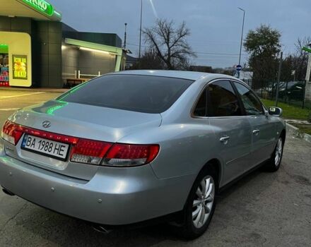 Серый Хендай Грандер, объемом двигателя 3.3 л и пробегом 200 тыс. км за 5800 $, фото 2 на Automoto.ua