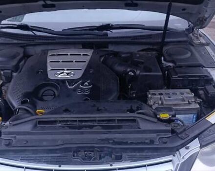 Серый Хендай Грандер, объемом двигателя 3.3 л и пробегом 300 тыс. км за 4900 $, фото 5 на Automoto.ua