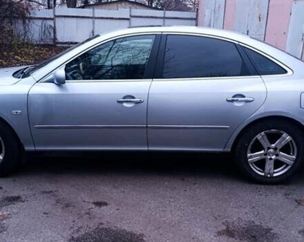 Серый Хендай Грандер, объемом двигателя 3.3 л и пробегом 300 тыс. км за 4900 $, фото 1 на Automoto.ua