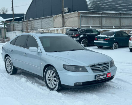 Сірий Хендай Грандер, об'ємом двигуна 3.3 л та пробігом 214 тис. км за 6690 $, фото 2 на Automoto.ua