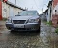 Сірий Хендай Грандер, об'ємом двигуна 3.34 л та пробігом 327 тис. км за 8000 $, фото 5 на Automoto.ua