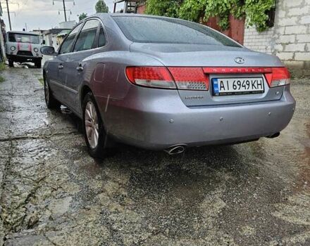 Сірий Хендай Грандер, об'ємом двигуна 3.34 л та пробігом 327 тис. км за 8000 $, фото 3 на Automoto.ua