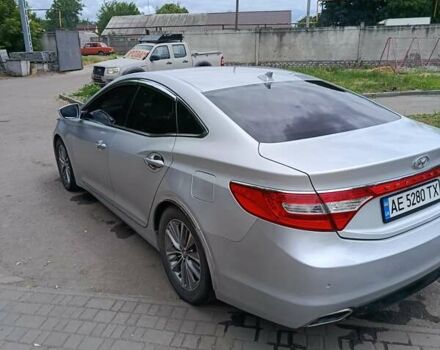 Сірий Хендай Грандер, об'ємом двигуна 3 л та пробігом 60 тис. км за 12800 $, фото 4 на Automoto.ua
