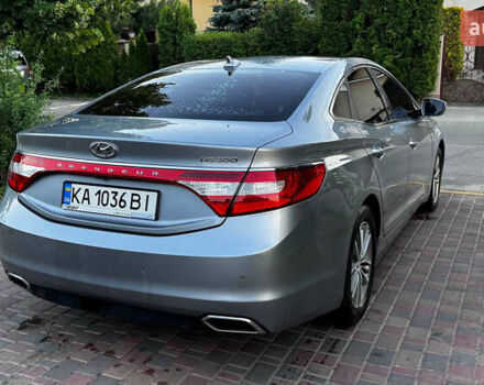 Сірий Хендай Грандер, об'ємом двигуна 3 л та пробігом 295 тис. км за 9500 $, фото 4 на Automoto.ua