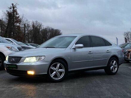 Серый Хендай Грандер, объемом двигателя 3.3 л и пробегом 237 тыс. км за 6490 $, фото 1 на Automoto.ua