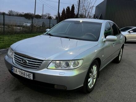 Серый Хендай Грандер, объемом двигателя 3.3 л и пробегом 200 тыс. км за 5800 $, фото 1 на Automoto.ua