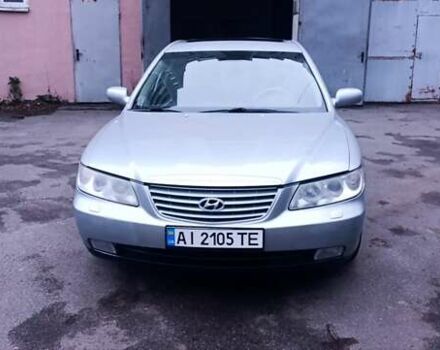 Серый Хендай Грандер, объемом двигателя 3.3 л и пробегом 300 тыс. км за 4900 $, фото 1 на Automoto.ua