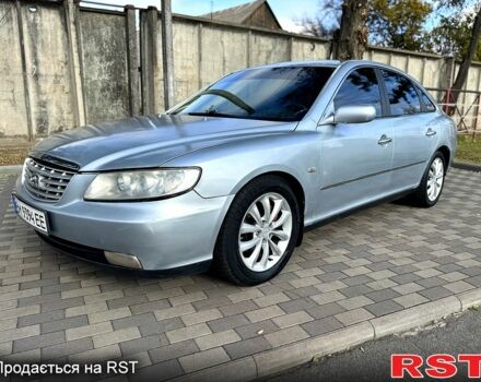 Серый Хендай Грандер, объемом двигателя 3.3 л и пробегом 265 тыс. км за 3800 $, фото 1 на Automoto.ua