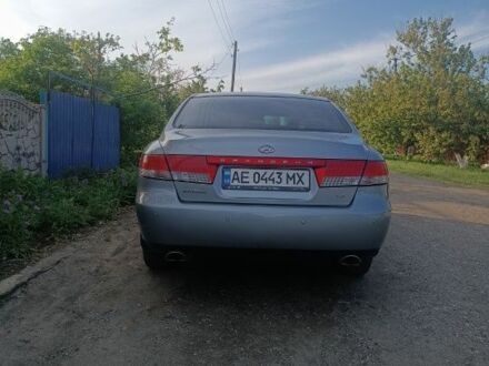 Серый Хендай Грандер, объемом двигателя 2.7 л и пробегом 280 тыс. км за 6700 $, фото 1 на Automoto.ua