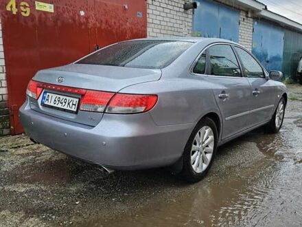 Серый Хендай Грандер, объемом двигателя 3.34 л и пробегом 327 тыс. км за 8000 $, фото 1 на Automoto.ua