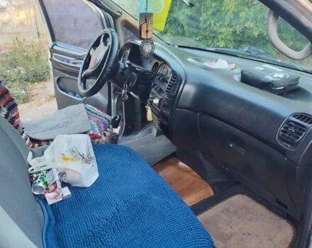 Серый Хендай Н 200, объемом двигателя 2.5 л и пробегом 590 тыс. км за 3600 $, фото 1 на Automoto.ua