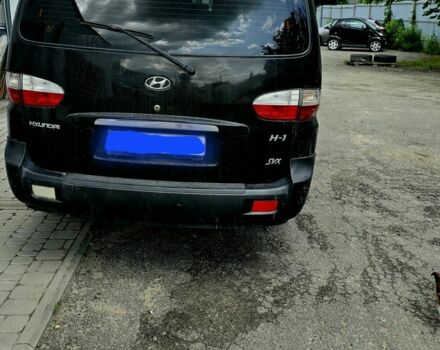Черный Хендай Н1 (Старекс), объемом двигателя 2.4 л и пробегом 255 тыс. км за 6500 $, фото 4 на Automoto.ua