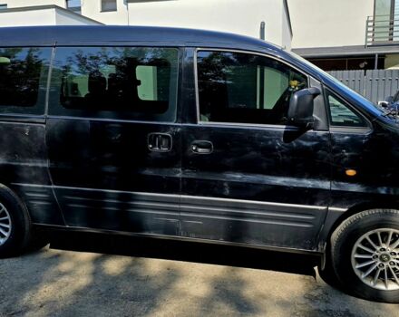 Черный Хендай Н1 (Старекс), объемом двигателя 2.4 л и пробегом 255 тыс. км за 6500 $, фото 1 на Automoto.ua