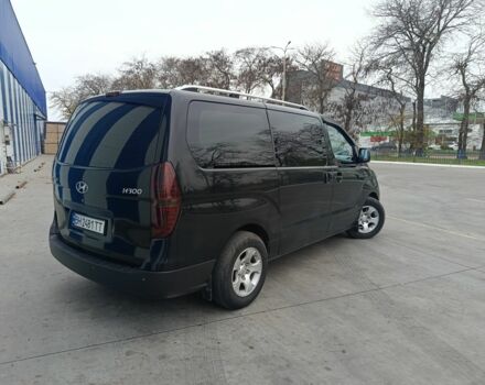 Черный Хендай Н1 (Старекс), объемом двигателя 2.5 л и пробегом 319 тыс. км за 10500 $, фото 3 на Automoto.ua