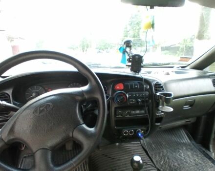 Серый Хендай Н1 (Старекс), объемом двигателя 2.4 л и пробегом 210 тыс. км за 4099 $, фото 4 на Automoto.ua