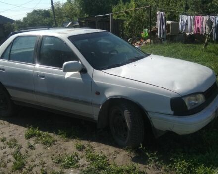 Белый Хендай Лантра, объемом двигателя 1 л и пробегом 12 тыс. км за 700 $, фото 1 на Automoto.ua