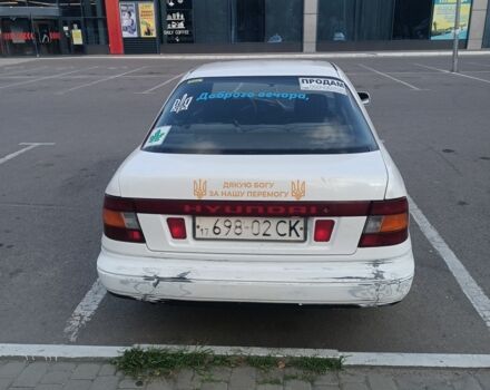 Белый Хендай Лантра, объемом двигателя 1.5 л и пробегом 200 тыс. км за 783 $, фото 3 на Automoto.ua