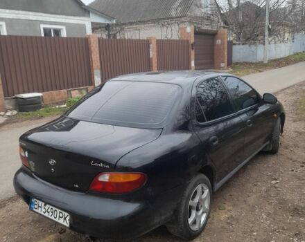 Чорний Хендай Лантра, об'ємом двигуна 1.6 л та пробігом 608 тис. км за 1500 $, фото 2 на Automoto.ua