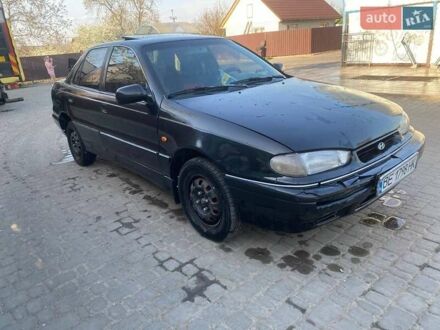 Хендай Лантра 1994 у Первомайске на Automoto.ua Чорний Хендай Лантра, об'ємом двигуна 1.47 л та пробігом 350 тис. км за 1800 $, фото 1 на Automoto.ua
