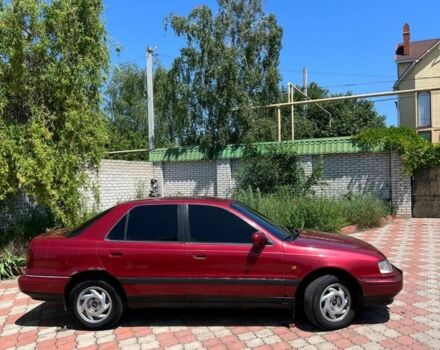 Красный Хендай Лантра, объемом двигателя 1.6 л и пробегом 260 тыс. км за 1000 $, фото 4 на Automoto.ua