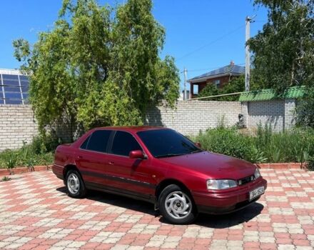 Красный Хендай Лантра, объемом двигателя 1.6 л и пробегом 260 тыс. км за 1000 $, фото 1 на Automoto.ua