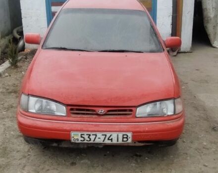 Червоний Хендай Лантра, об'ємом двигуна 1 л та пробігом 198 тис. км за 700 $, фото 4 на Automoto.ua