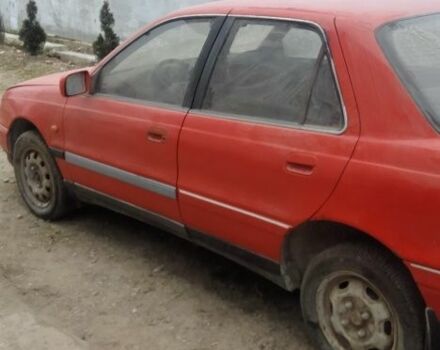 Червоний Хендай Лантра, об'ємом двигуна 1 л та пробігом 198 тис. км за 700 $, фото 9 на Automoto.ua