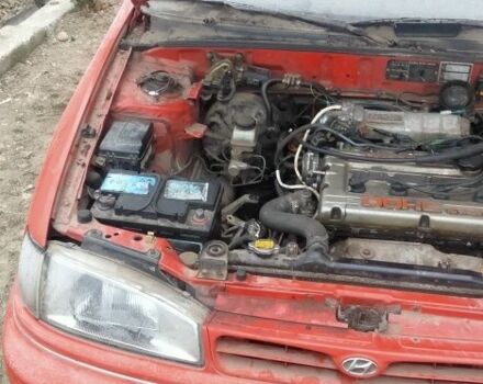 Червоний Хендай Лантра, об'ємом двигуна 1 л та пробігом 198 тис. км за 700 $, фото 6 на Automoto.ua