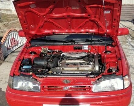Червоний Хендай Лантра, об'ємом двигуна 1 л та пробігом 198 тис. км за 700 $, фото 10 на Automoto.ua