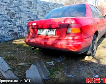 Красный Хендай Лантра, объемом двигателя 15 л и пробегом 350 тыс. км за 750 $, фото 1 на Automoto.ua