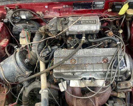 Красный Хендай Лантра, объемом двигателя 1.6 л и пробегом 300 тыс. км за 500 $, фото 2 на Automoto.ua