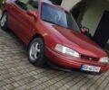 Красный Хендай Лантра, объемом двигателя 1.5 л и пробегом 373 тыс. км за 2000 $, фото 1 на Automoto.ua
