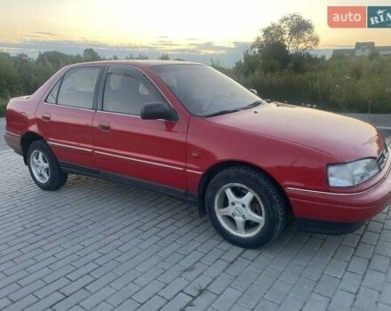 Червоний Хендай Лантра, об'ємом двигуна 1.6 л та пробігом 334 тис. км за 2000 $, фото 1 на Automoto.ua