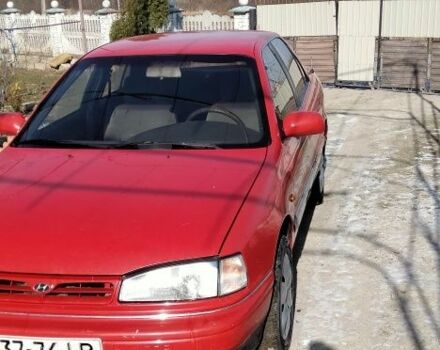 Красный Хендай Лантра, объемом двигателя 1 л и пробегом 198 тыс. км за 700 $, фото 1 на Automoto.ua