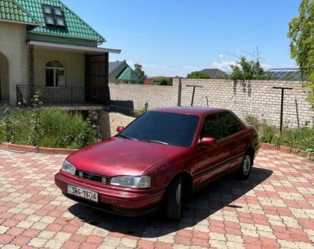 Красный Хендай Лантра, объемом двигателя 1.6 л и пробегом 260 тыс. км за 1000 $, фото 1 на Automoto.ua
