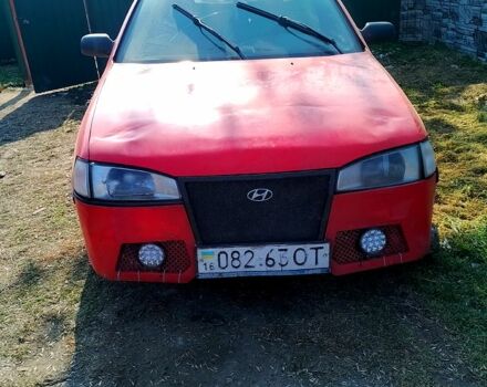 Красный Хендай Лантра, объемом двигателя 15 л и пробегом 350 тыс. км за 750 $, фото 1 на Automoto.ua