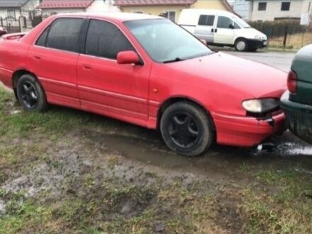 Красный Хендай Лантра, объемом двигателя 1 л и пробегом 266 тыс. км за 400 $, фото 1 на Automoto.ua