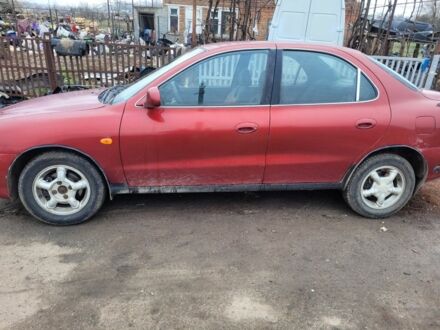 Хендай Лантра 1996 у Никополе на Automoto.ua Червоний Хендай Лантра, об'ємом двигуна 1.8 л та пробігом 200 тис. км за 1500 $, фото 1 на Automoto.ua