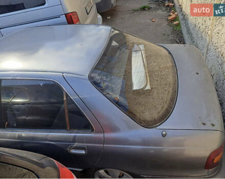 Серый Хендай Лантра, объемом двигателя 1.6 л и пробегом 178 тыс. км за 1250 $, фото 1 на Automoto.ua