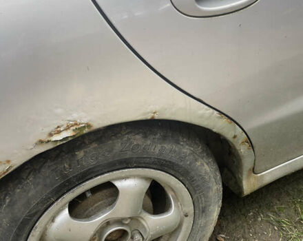 Сірий Хендай Лантра, об'ємом двигуна 1.8 л та пробігом 319 тис. км за 1000 $, фото 8 на Automoto.ua