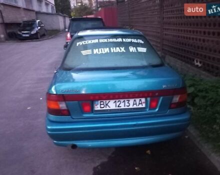 Синий Хендай Лантра, объемом двигателя 1.5 л и пробегом 317 тыс. км за 2100 $, фото 4 на Automoto.ua