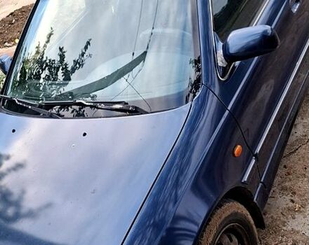 Синий Хендай Лантра, объемом двигателя 1.6 л и пробегом 232 тыс. км за 1200 $, фото 1 на Automoto.ua