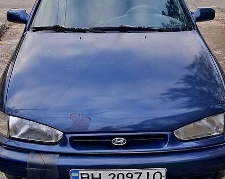 Синий Хендай Лантра, объемом двигателя 1.6 л и пробегом 232 тыс. км за 1200 $, фото 4 на Automoto.ua