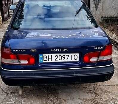Синий Хендай Лантра, объемом двигателя 1.6 л и пробегом 232 тыс. км за 1200 $, фото 2 на Automoto.ua